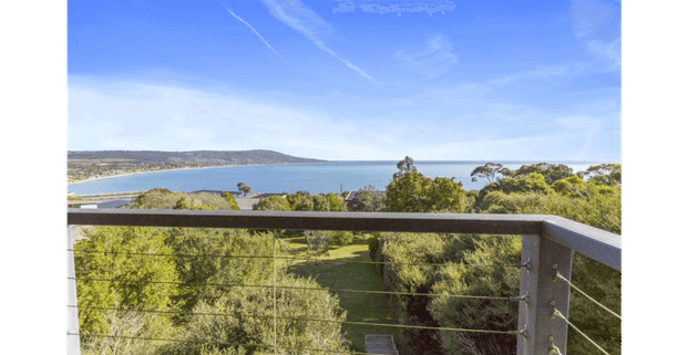 Beachside Luxury with Sweeping Bay Views - Photo 1