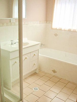 Three-Bedroom Home in Sought-After Albion Park Location - Photo 1