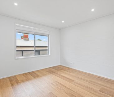 Renovated Upstairs Unit - Photo 2