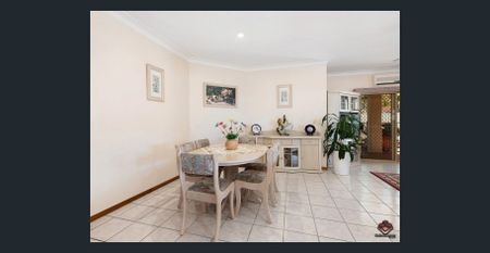 Modern Family Oasis with Pool in a Highly Sought-After Helensvale Location - Photo 3