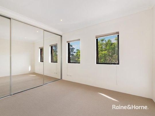 FAMILY SIZED TOWNHOUSE IN PRIME POSITION - Photo 1
