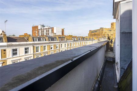 A charming fourth floor period conversion in a prime South Kensington location, boasting plenty of natural light and a private balcony. - Photo 2