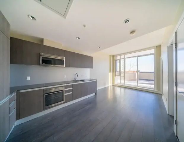 Modern Condo with High Ceilings Spacious Patio - The Guardian | 1188 3 Street Southeast, Calgary - Photo 1