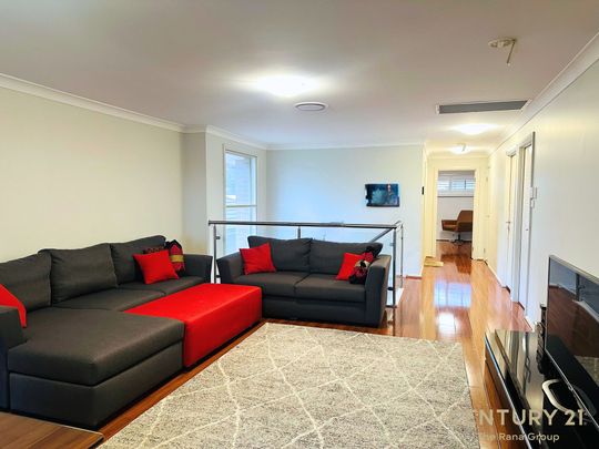 Spacious 6-Bedroom Family Home with Premium Features - Photo 1