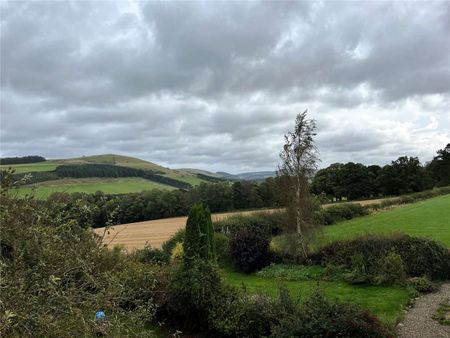 1 Town-o-Rule is a recently refurbished two-bedroom end-terrace cottage nestled in the picturesque countryside, offering the perfect blend of traditional character and modern amenities. - Photo 2