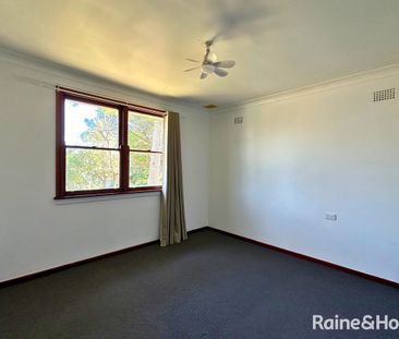 Neat & Tidy Home with Generous Backyard - Photo 2