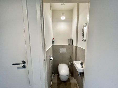 Gerenoveerd 2-slaapkamer appartement incl garage - Photo 3