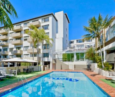 Move-In Ready Studio with Leafy Outlook and Resort Amenities - Photo 1