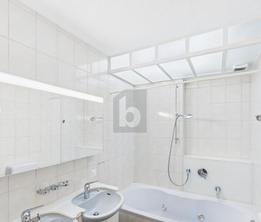 WITH VISIBLE BEAMS AND TILE STOVES! - Photo 2