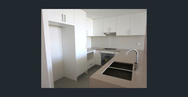 MODERN & CONVENIENT TWO BEDROOM APARTMENT PLUS STUDY AREA - Photo 1