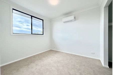 Brand-New, Effortless Modern Living in a Light-Filled Family Home - Photo 4