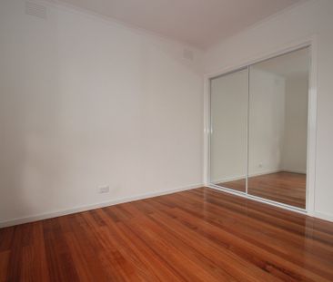 Spacious Three-Bedroom Home and Convenient Location - Photo 2