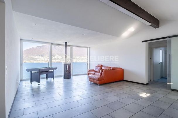 ENCHANTING PENTHOUSE WITH LAKE VIEW IN PIAZZOGNA - Photo 1
