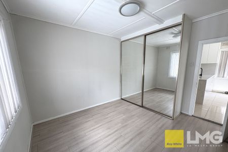 NEAT FAMILY HOME IN CONVENIENT LOCATION - Photo 2