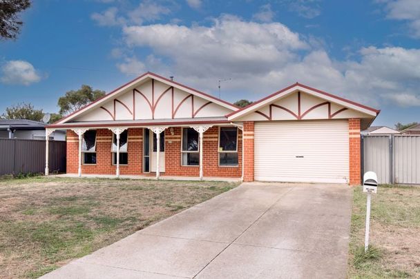 Three Bedroom Home with Central Heating and Cooling - Photo 1