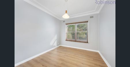 Three bedroom home with single garage, where the back yard lawn is mowed for you! - Photo 4