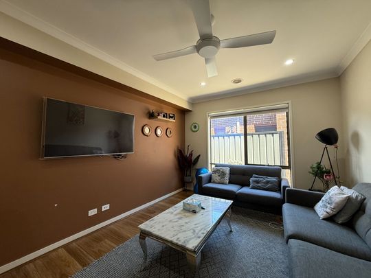 Spacious 4-Bedroom Home with Two Living Areas and Modern Upgrades - Photo 1