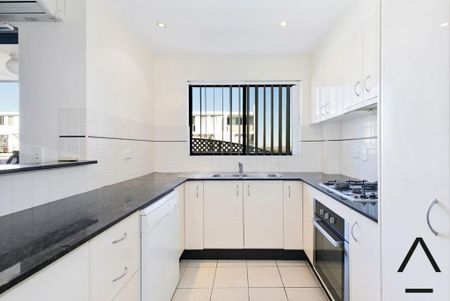 Centrally Situated, Private and Secure Penthouse — Three Bedroom, Two Bathroom Oasis in a Superb Location - Photo 4