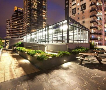 Stylish 1-Bedroom Apartment with Stunning City Views - Photo 3