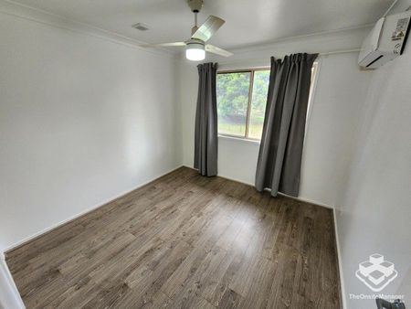 Double Garage, Air-Conditioned and wooden flooring throughout! - Photo 5