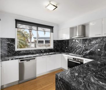 Stylish Family Home with Pool, Bar & Balcony in Prime Werribee Loca... - Photo 5