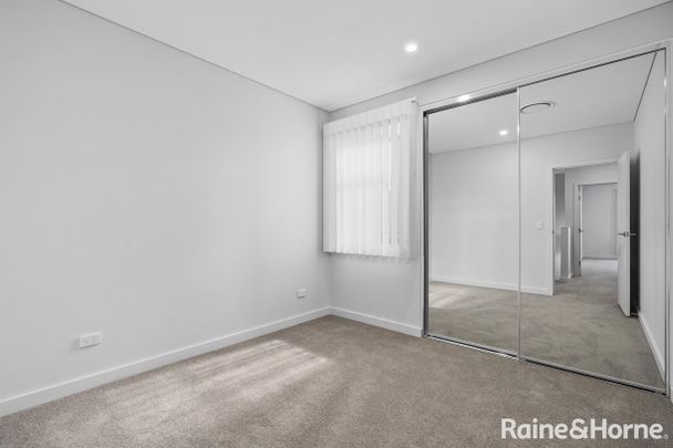 Modern Tri-Level Home in a Prime Edmondson Park Location! - Photo 1