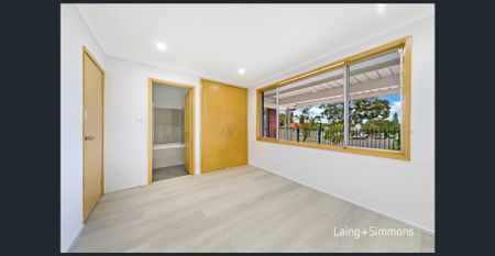 Refreshed brick home with brand new kitchen - Photo 2