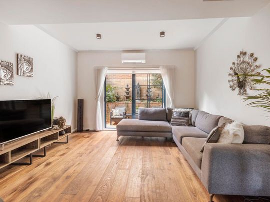 RENOVATED COURTYARD RETREAT IN ‘DEAUVILLE GARDENS’ - Photo 1