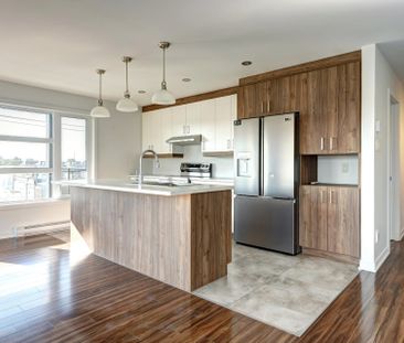 Appartement à Sainte-Marthe-sur-le-Lac - Photo 3