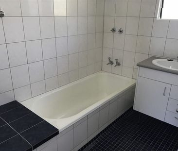 CONVENIENTLY LOCATED FAMILY HOME WITH LARGE YARD - Photo 6