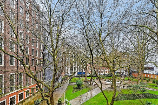 Contemporary 1 bedroom apartment, overlooking a pretty garden square, in a well maintained modern building with 24/7 concierge. - Photo 1