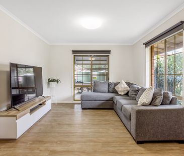 Elegant, Low-Maintenance Living in a Prime Golden Square Location - Photo 2