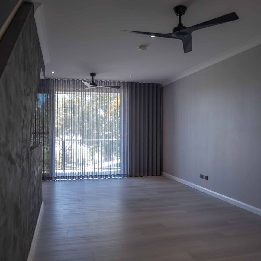 Fully Renovated Living in the Heart of Emerald Lakes - Photo 1