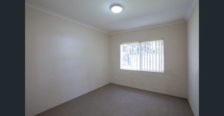 Two Bedroom Unit with Air Conditioner & Garage - Photo 2