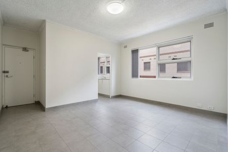 RENOVATED 2 BEDROOM UNITS WITH CAR SPACE - Photo 4