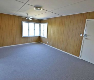 Spacious Family Home with Huge Yard, Side Access & Plenty of Storage! - Photo 1