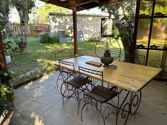 Charming 2BR Home with Outdoor Bliss - Photo 1