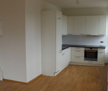 Rent a 3 ½ rooms apartment in Delémont - Photo 2