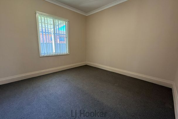 Cozy 3 Bedroom Coastal Home - Photo 1