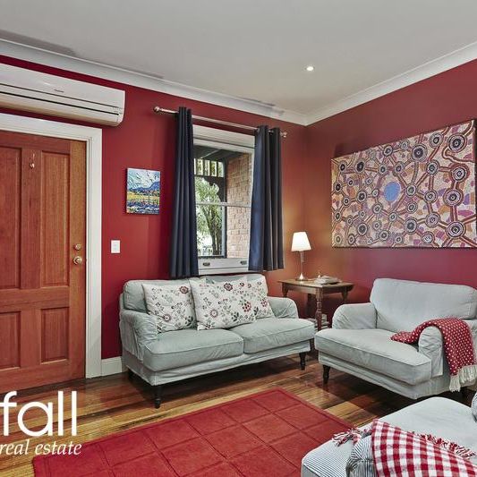 Fully Furnished Charming Character Townhouse - Photo 1