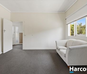 Three-Bedroom Home with Spacious Yard - Photo 1