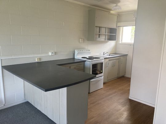 Welcome to this cozy and inviting 2-bedroom, 1-bathroom unit nestled in the heart of Whitiora. - Photo 1