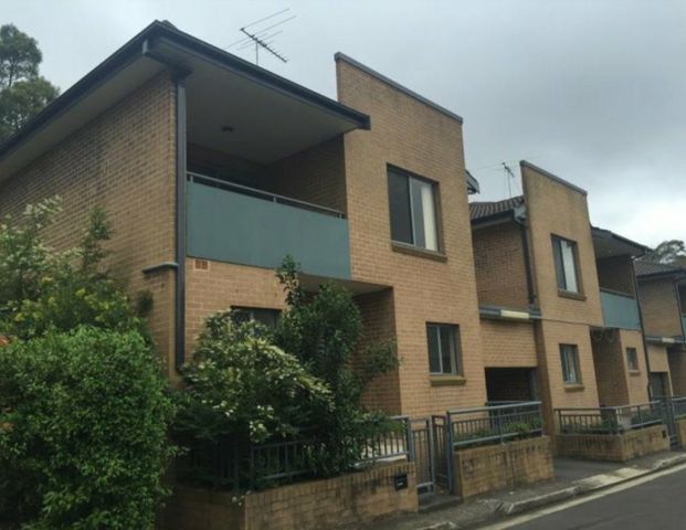 2-Bedroom Townhouse with Garage - Photo 1