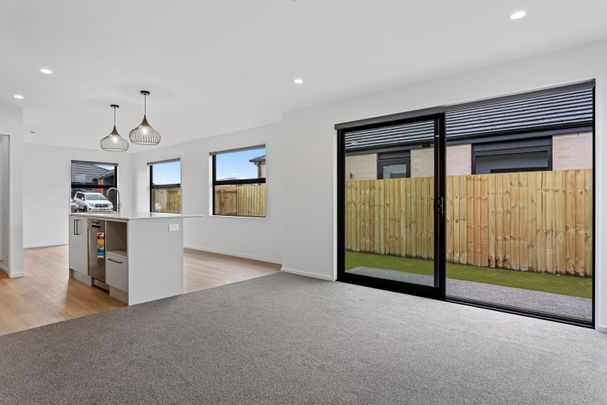Brand New Stylish and Sunny four bedroom Home! - Photo 1
