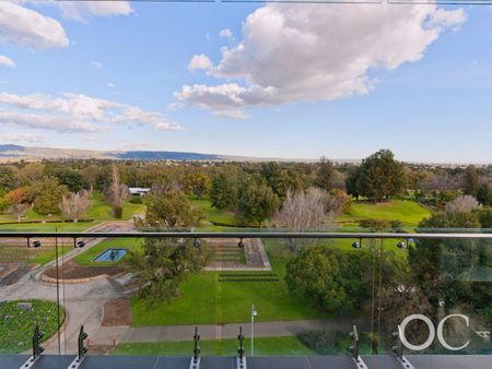 Open the Door to Luxury Living with Breathtaking Parkland Views - Photo 4