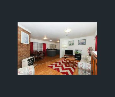 Comfortable 3-Bedroom Home with Modern Kitchen & Secure Features - Photo 2