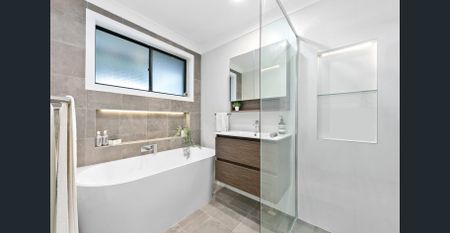 Impressive Family Home with Modern Features and Entertainer's Dream Deck - Photo 4