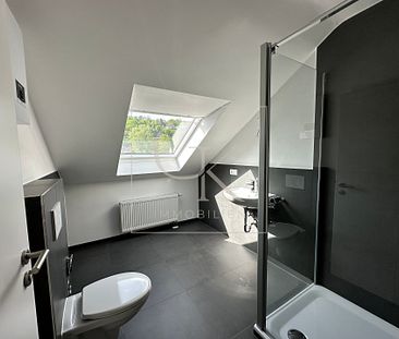 Erstbezug nach Modernisierung von heller gemütlicher 4-Zimmer-DG-Wohnung - Photo 4