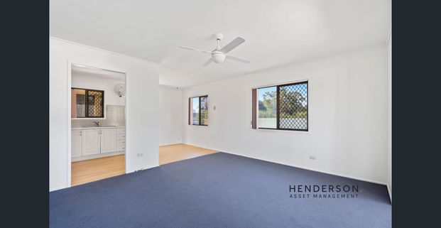 CHARMING HIGH-SET HOME WITH HUGE YARD & POTENTIAL - Photo 1