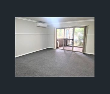 Comfortable & secure two bedroom unit in ideal location - Photo 2